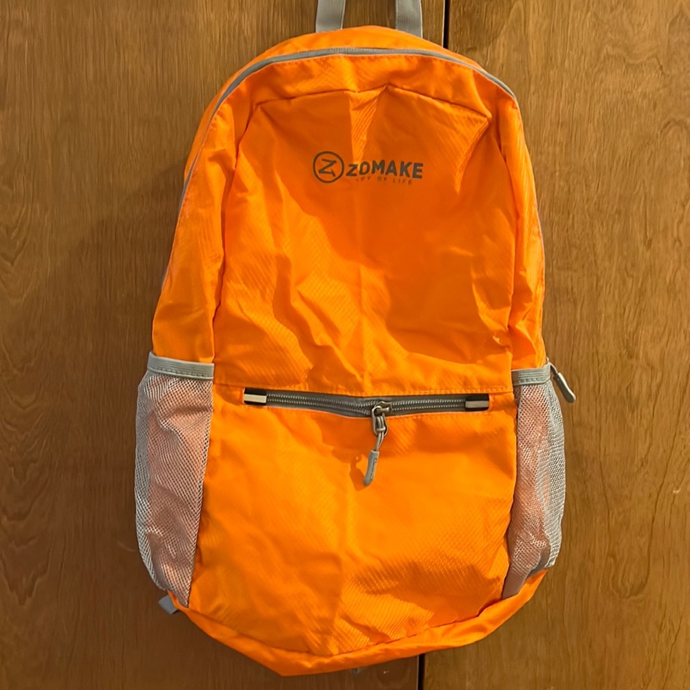 Zomake orange lightweight backpack nwot